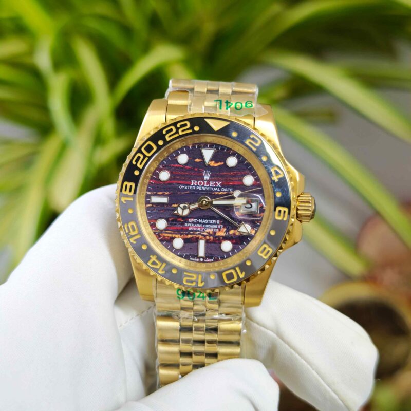 Rolex GMT-Master II Yellow Gold Jubilee Tiger Iron Dial