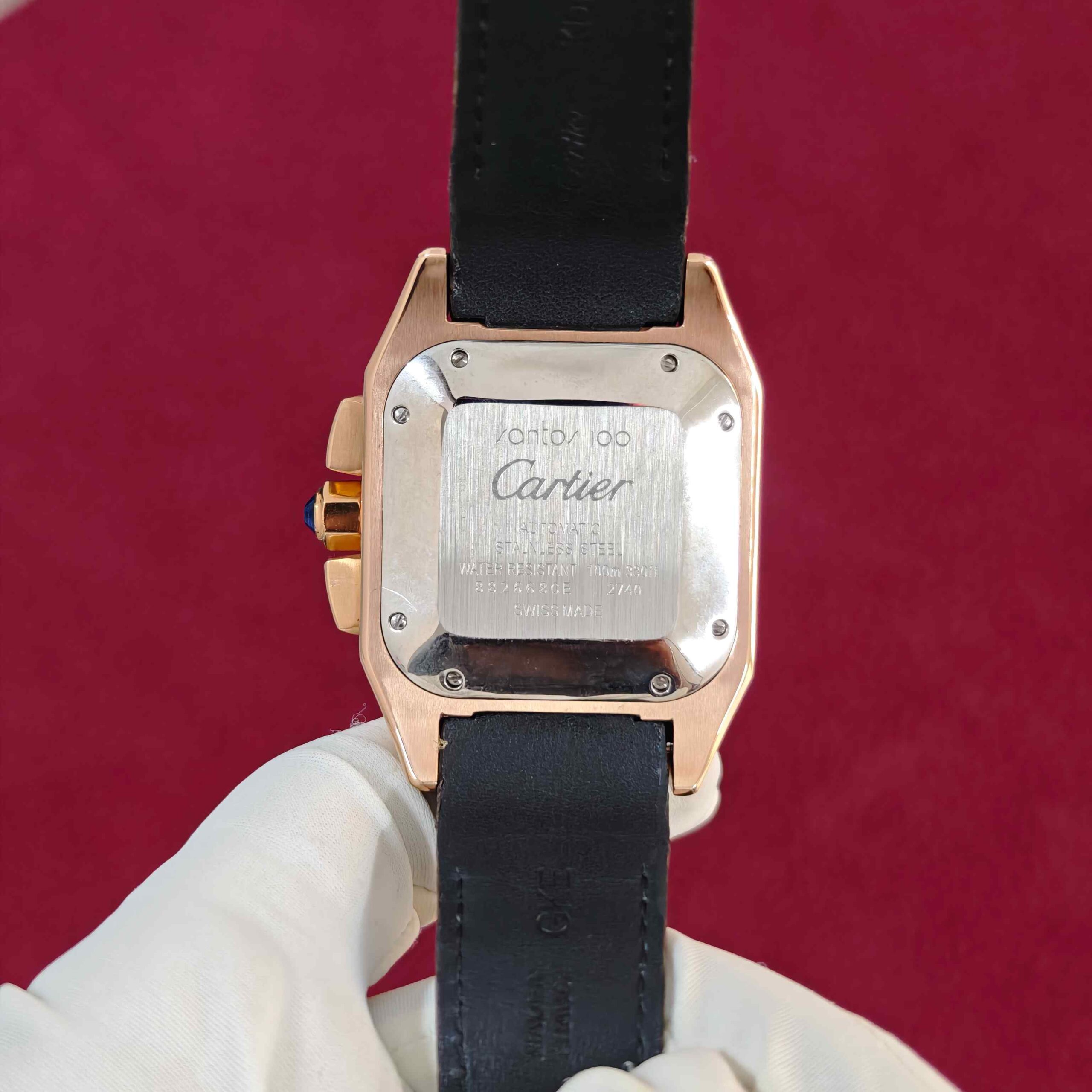 Cartier Santos Chronograph automatic watch featuring a rose gold case, elegant white dial, chronograph sub-dials, and premium brown leather strap.