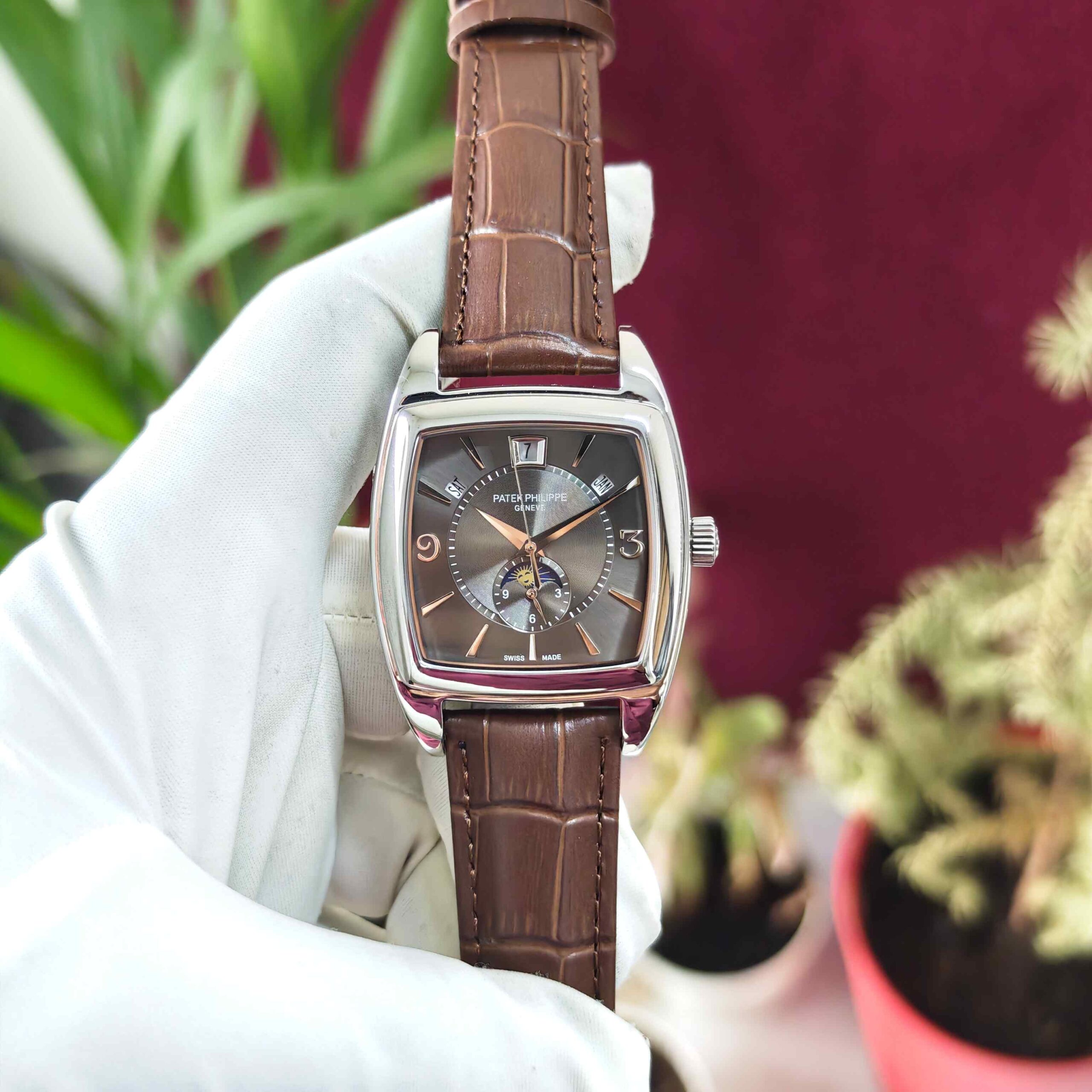 Patek Philippe Gondolo Annual Calendar steel automatic watch featuring a sophisticated dark silver dial, elegant rectangular case, and premium luxury design.
