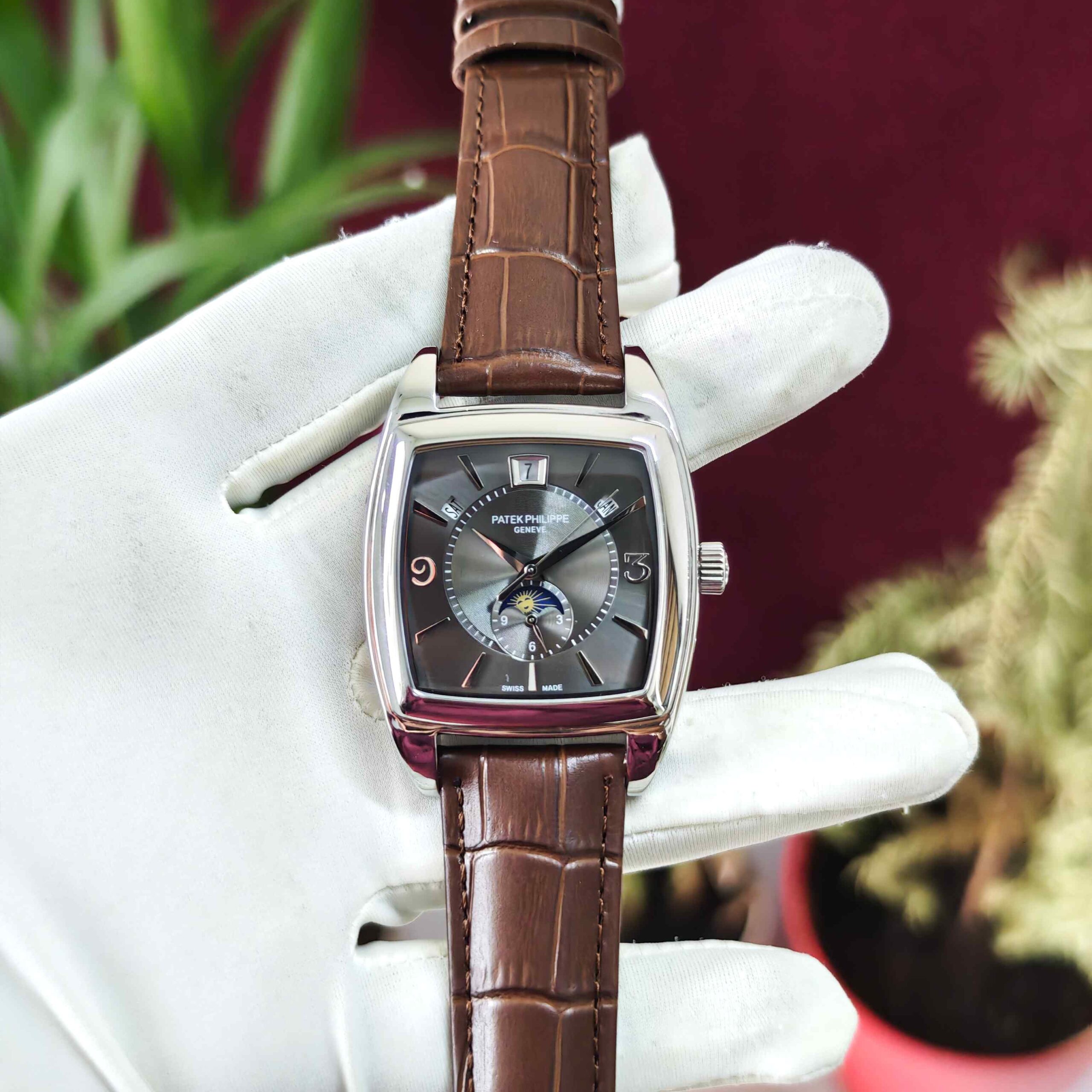 Patek Philippe Gondolo Annual Calendar steel automatic watch featuring a sophisticated dark silver dial, elegant rectangular case, and premium luxury design.