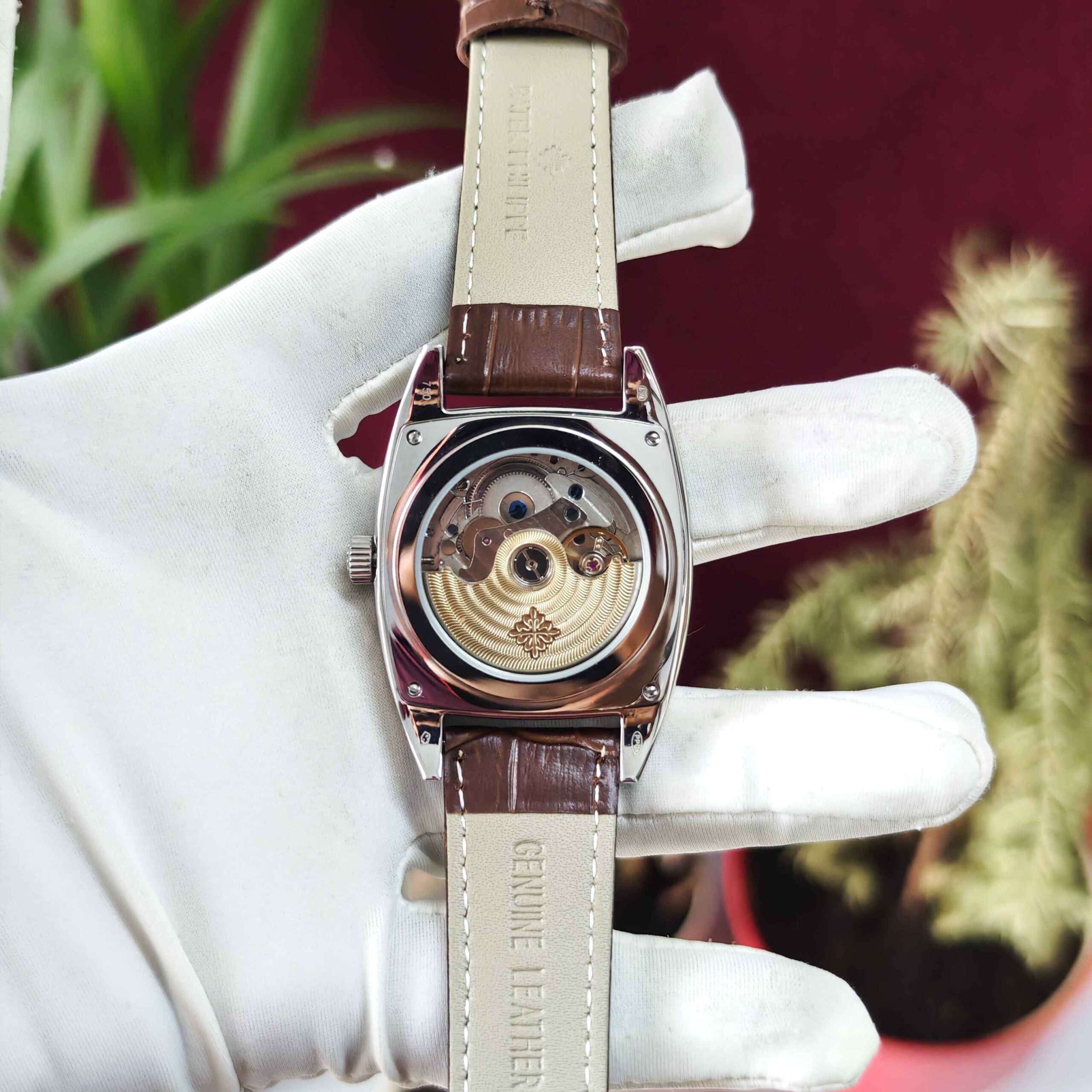 Patek Philippe Gondolo Annual Calendar steel automatic watch featuring a sophisticated dark silver dial, elegant rectangular case, and premium luxury design.