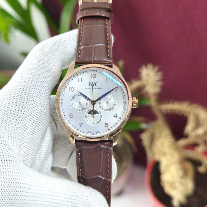 IWC Schaffhausen Portugieser Perpetual Calendar 42 White Dial Swiss Automatic Luxury Watch with elegant leather strap and sapphire crystal.