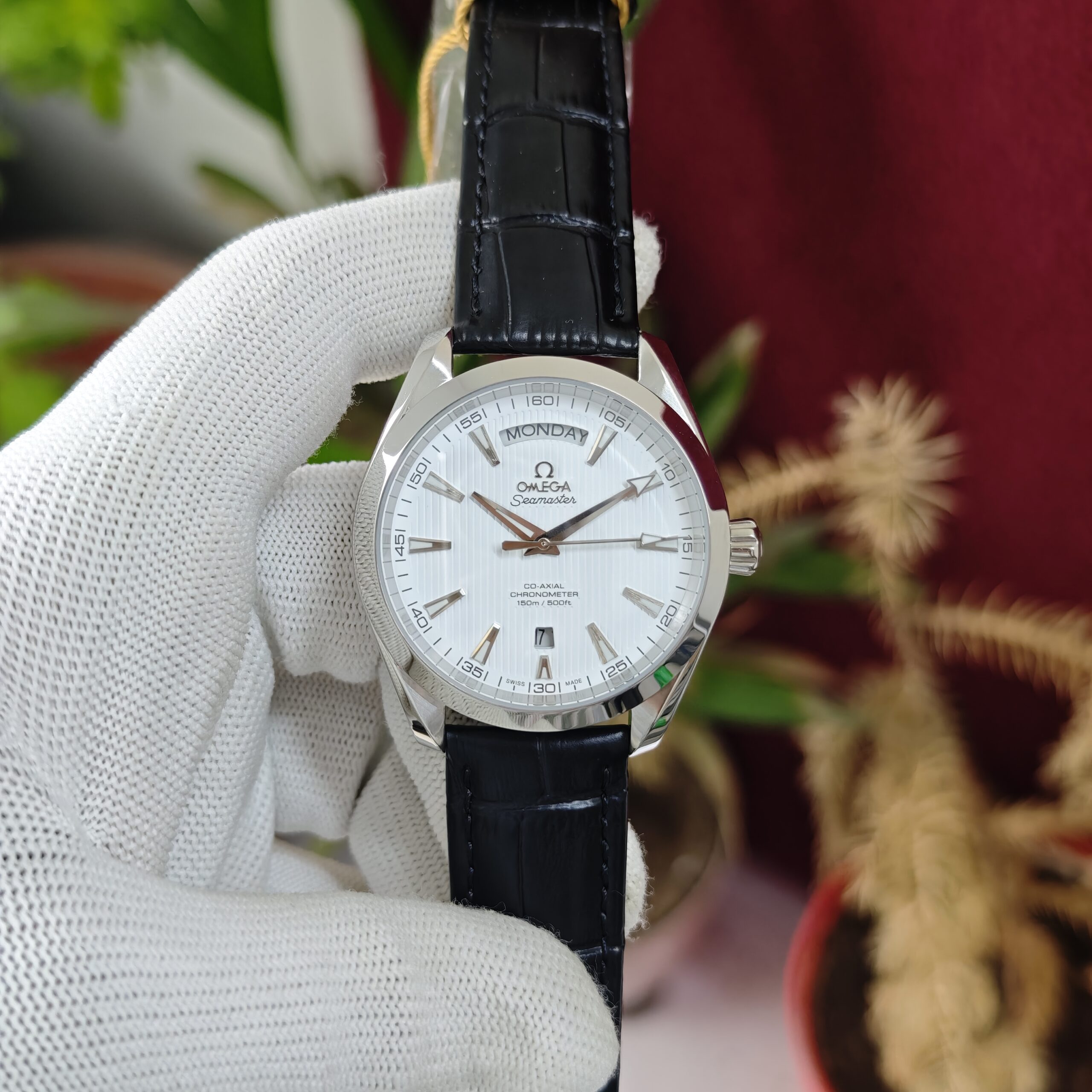 Omega Seamaster Aqua Terra Day-Date Steel Full White Dial Leather Strap Swiss Automatic Watch with elegant luxury styling.