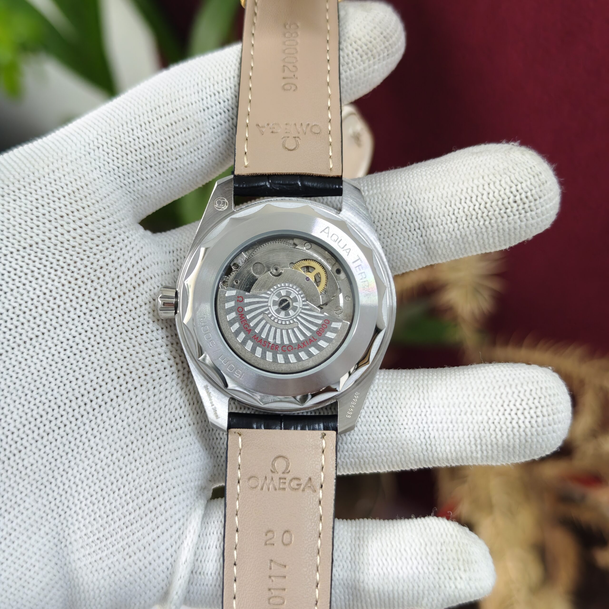 Omega Seamaster Aqua Terra Day-Date Steel Full White Dial Leather Strap Swiss Automatic Watch with elegant luxury styling.