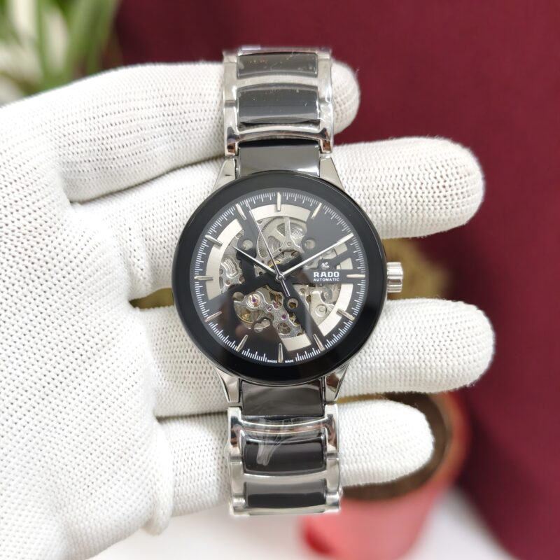 Rado Centrix Black and Silver Skeleton Dial Swiss Automatic Watch with stainless steel bracelet and sapphire crystal glass.