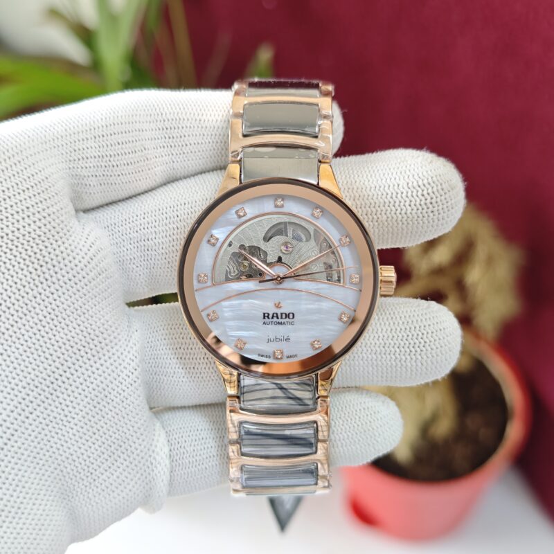 Rado Centrix Diamonds Open Heart White Dial Swiss Automatic Watch with diamond hour markers, sapphire crystal, and luxury stainless steel bracelet.